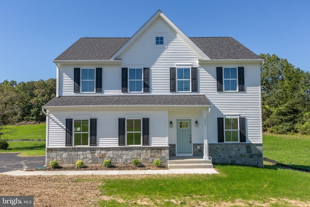 view of front of home with a front yard