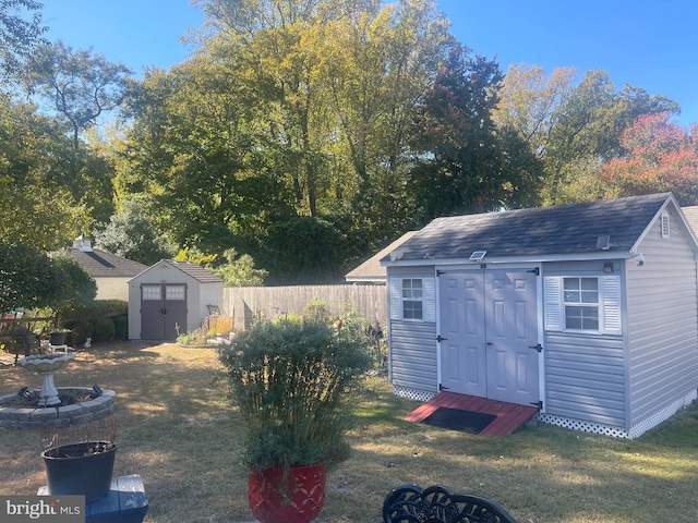 view of outbuilding with a lawn