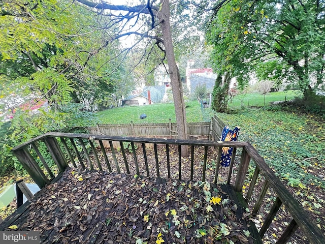 deck featuring a lawn