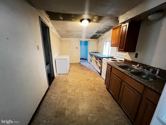 kitchen with sink and white range with electric cooktop