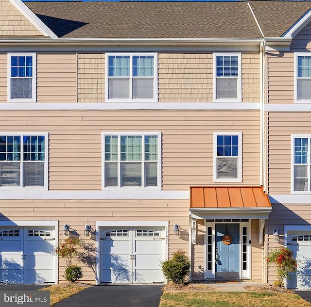 view of property with a garage