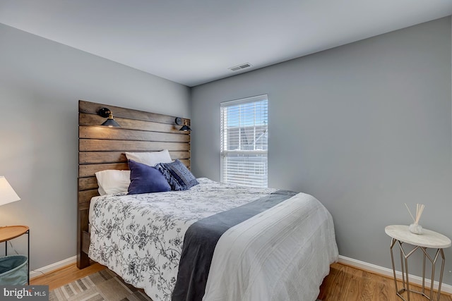 bedroom featuring light hardwood / wood-style floors