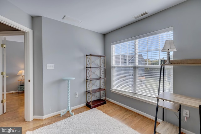 miscellaneous room with hardwood / wood-style flooring