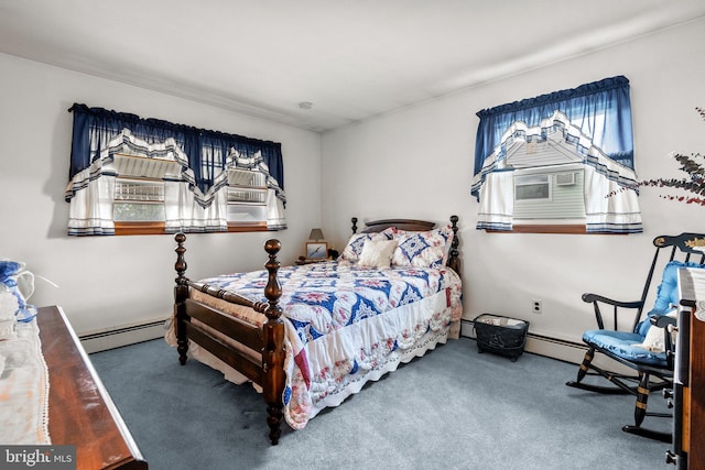 carpeted bedroom featuring a baseboard heating unit