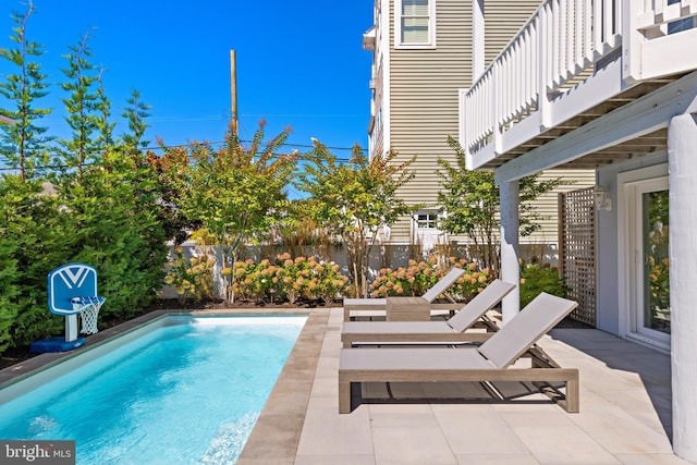 view of pool with a patio area