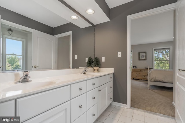 bathroom featuring tile patterned floors and vanity