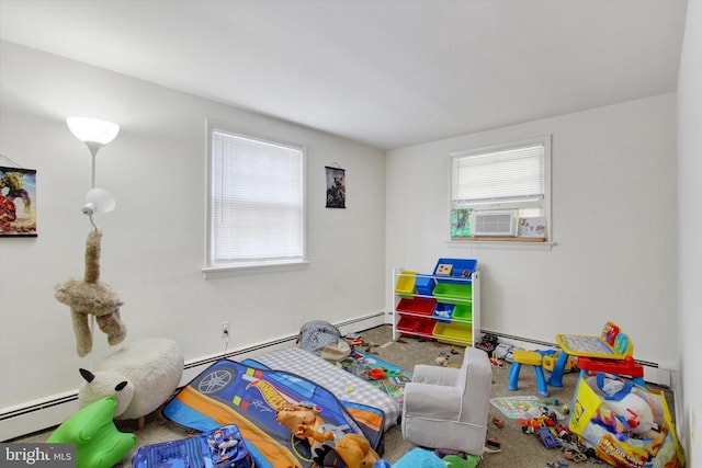 carpeted bedroom featuring cooling unit and baseboard heating