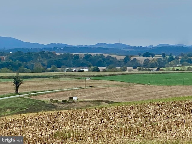 view of mountain feature with a rural view