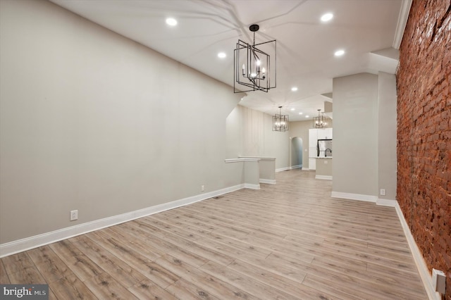 unfurnished living room with light hardwood / wood-style flooring