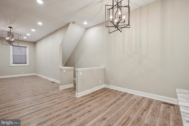 unfurnished dining area with light wood-type flooring