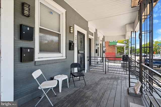 deck featuring covered porch