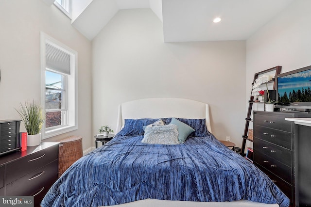 bedroom with vaulted ceiling