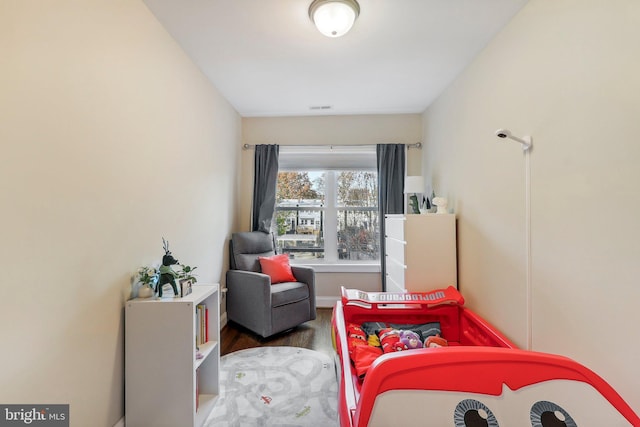 bedroom featuring hardwood / wood-style floors