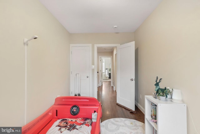 recreation room featuring dark hardwood / wood-style floors