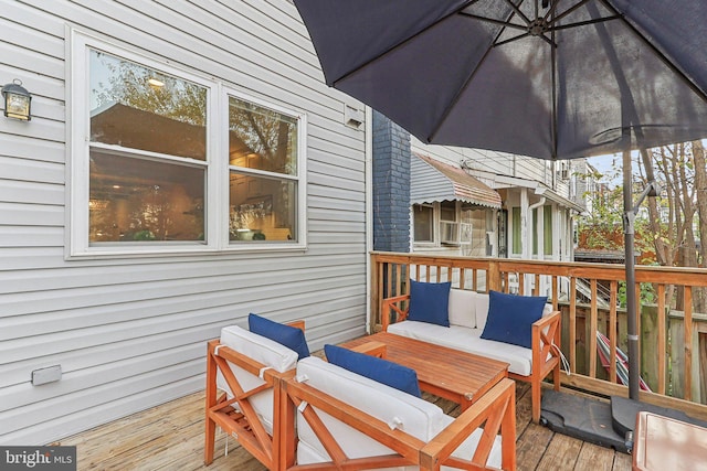 deck with cooling unit and an outdoor hangout area