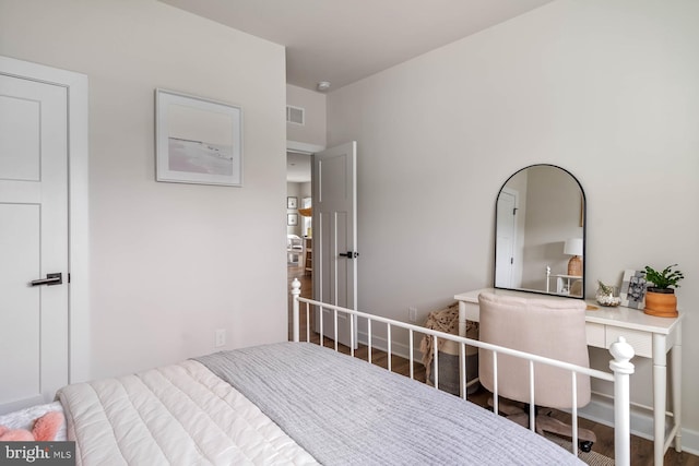 bedroom featuring hardwood / wood-style floors