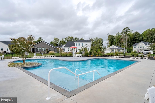 view of pool featuring a patio area