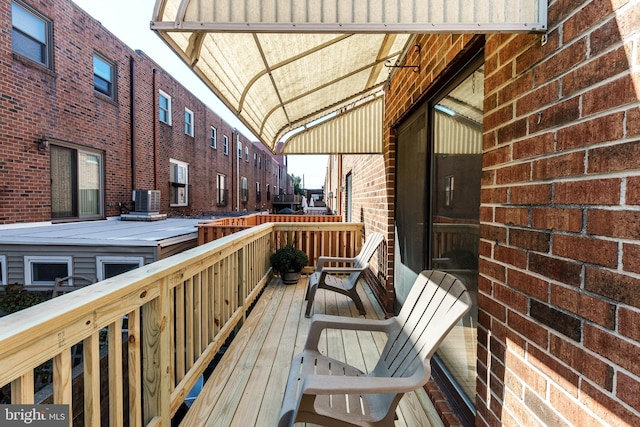 wooden terrace featuring central AC