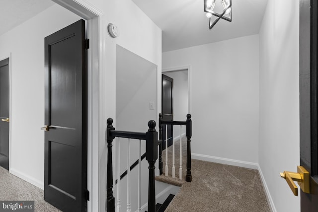 corridor with carpet floors