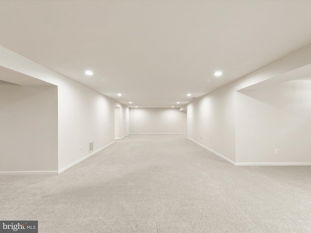 basement with light carpet