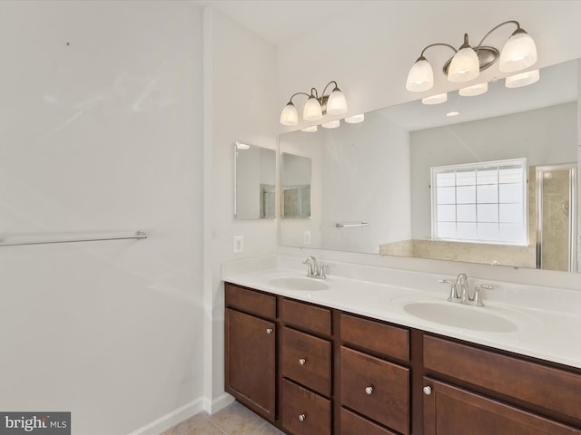 bathroom with vanity and tile patterned floors