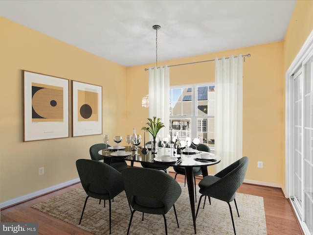 dining room featuring light hardwood / wood-style flooring