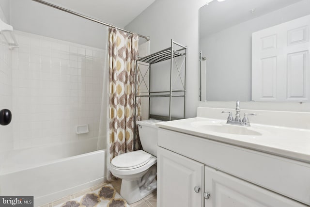 full bathroom featuring toilet, shower / bath combo, vanity, and tile patterned floors