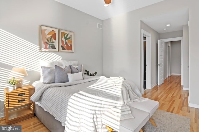 bedroom featuring hardwood / wood-style flooring