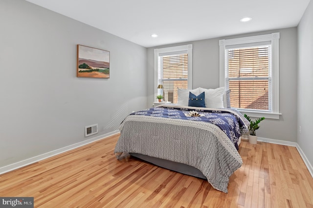 bedroom featuring light hardwood / wood-style floors