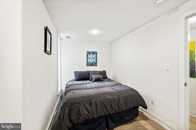 bedroom featuring light hardwood / wood-style flooring