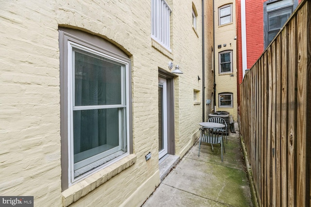 view of side of home featuring a patio