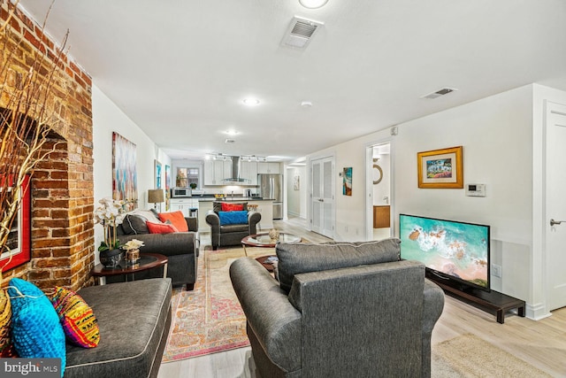 living room with light wood-type flooring