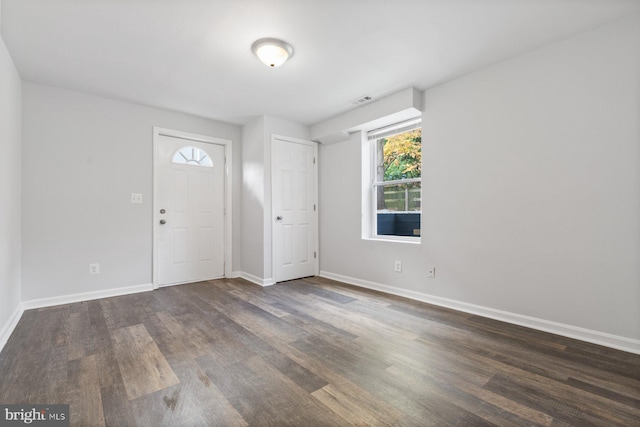 foyer entrance featuring dark hardwood / wood-style flooring