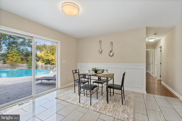 dining space featuring light hardwood / wood-style floors