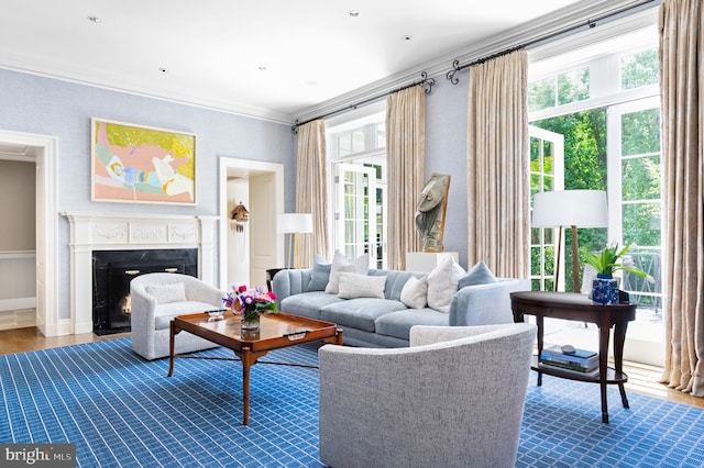 living room with ornamental molding and hardwood / wood-style flooring