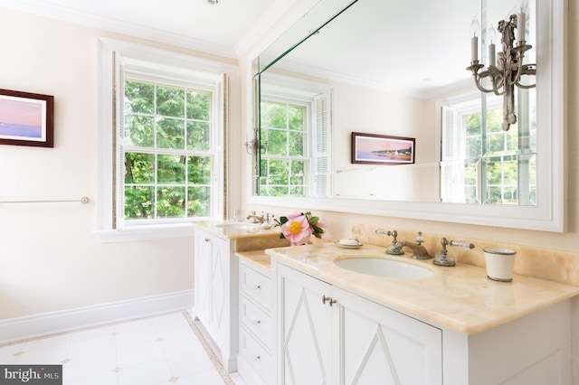 bathroom with vanity, ornamental molding, and a wealth of natural light