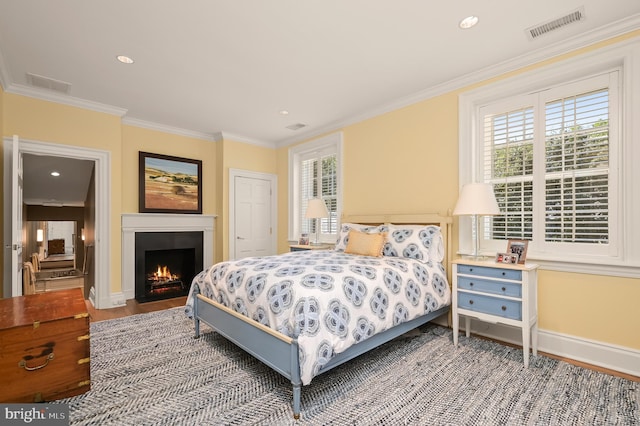 bedroom featuring ornamental molding