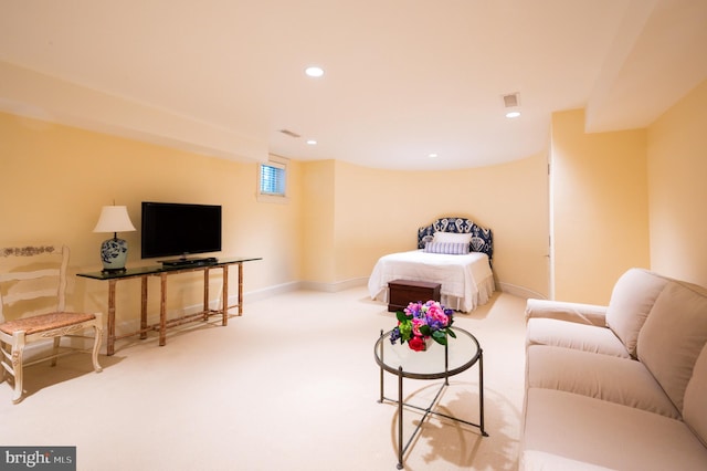 bedroom featuring light carpet