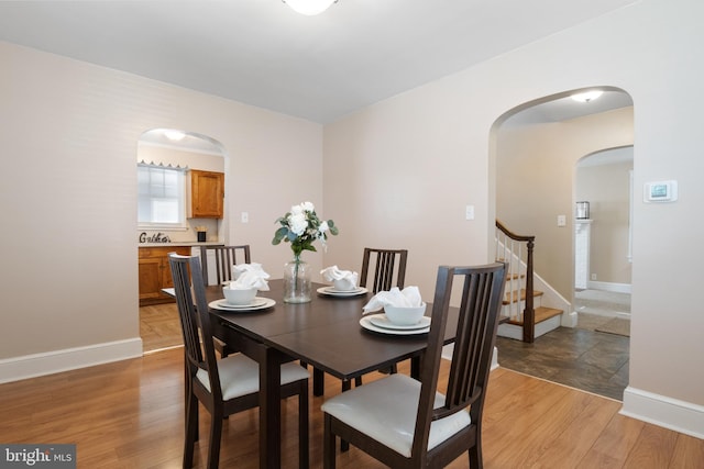 dining space featuring light hardwood / wood-style flooring