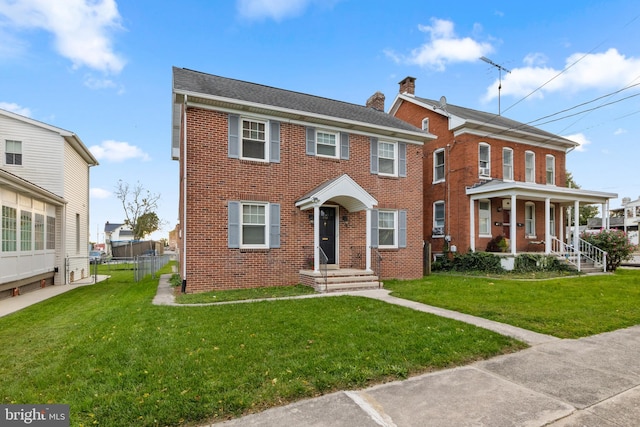 view of front of house with a front lawn