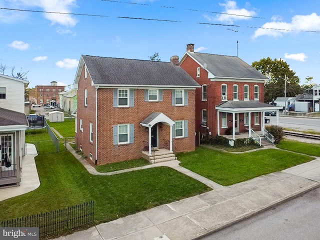 view of front of home with a front yard