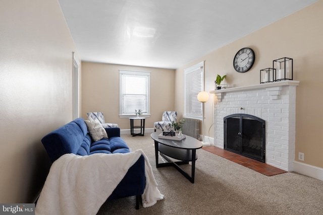 carpeted living room featuring a brick fireplace