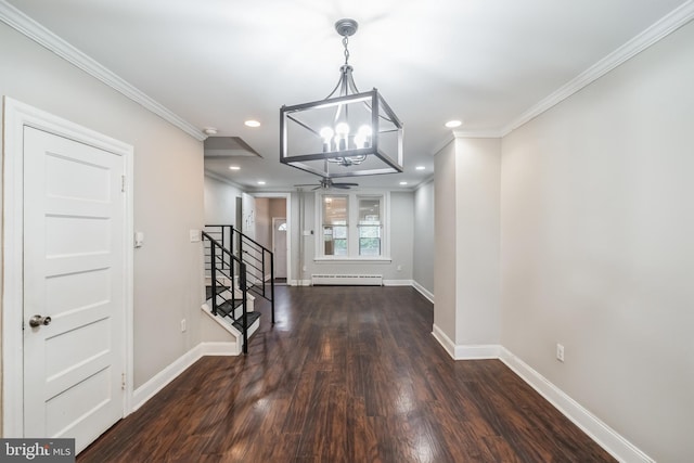 entrance foyer with dark wood-type flooring, ceiling fan with notable chandelier, ornamental molding, and a baseboard radiator