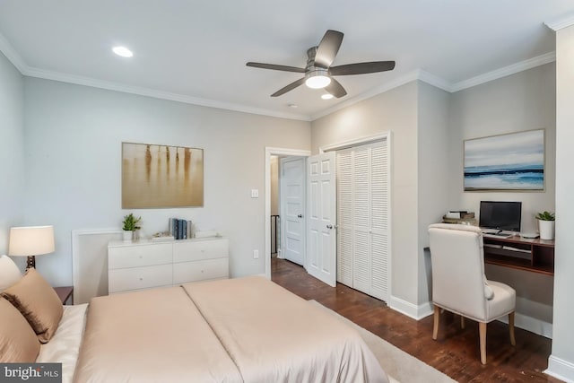 bedroom featuring crown molding, ceiling fan, a closet, and dark hardwood / wood-style floors