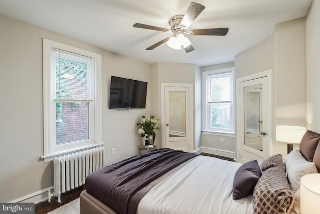 1715 N Felton St, Philadelphia, PA 19151 - bedroom with radiator heating unit, ceiling fan, baseboards, and wood finished floors