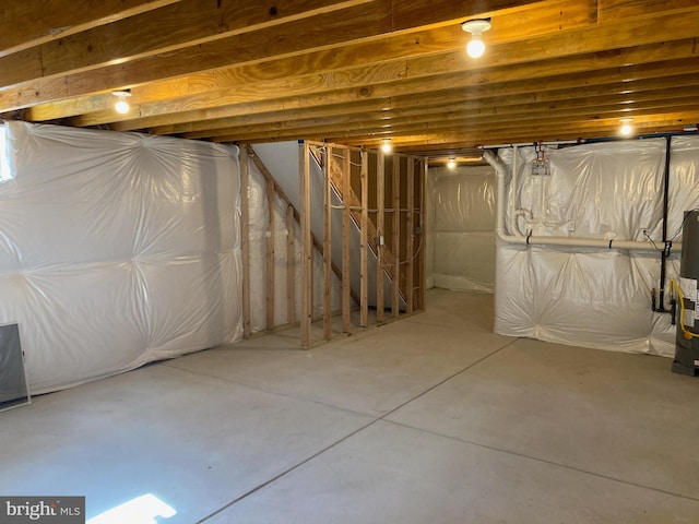 basement featuring water heater