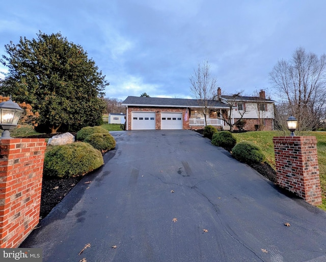 view of front of property with a garage