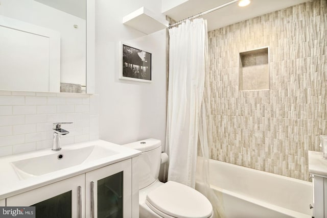 full bathroom with vanity, toilet, shower / bathtub combination with curtain, and backsplash