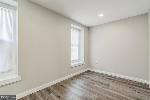 empty room featuring light hardwood / wood-style floors