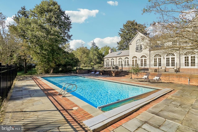 view of pool with a patio